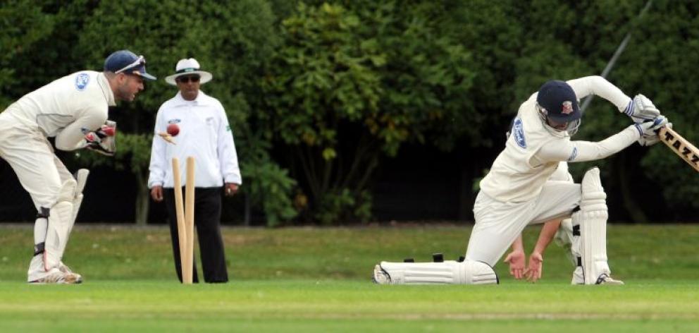 Auckland batsman Dusan Hakaraia looks back as he is bowled by Otago spinner Mark Craig during the Plunket Shield match at the University Oval yesterday. The Otago wicketkeeper is Derek de Boorder and the umpire is Ashley Mehrotra. Photo by Craig Baxter.