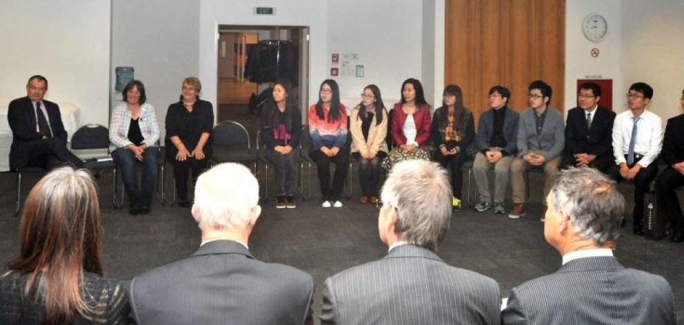 A group of Chinese tertiary students on scholarships from Shanghai is welcomed to Dunedin by members of the Dunedin City Council, local iwi and education providers on Thursday. Photo by Gregor Richardson. 