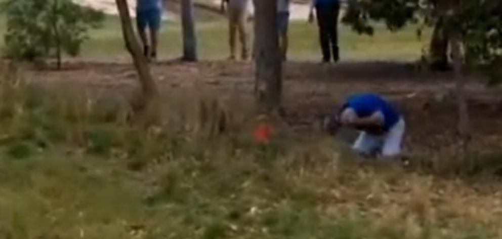A spectator was struck in the face by a errant drive by Steven Bowditch. Photo / YouTube