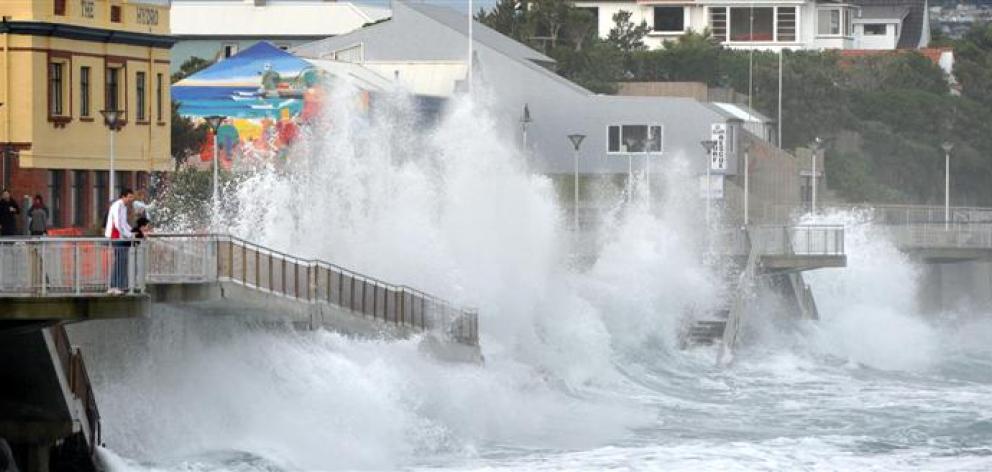 The St Clair Beach seawall is battered by 2m waves yesterday evening. Photo by Nigel Benson.