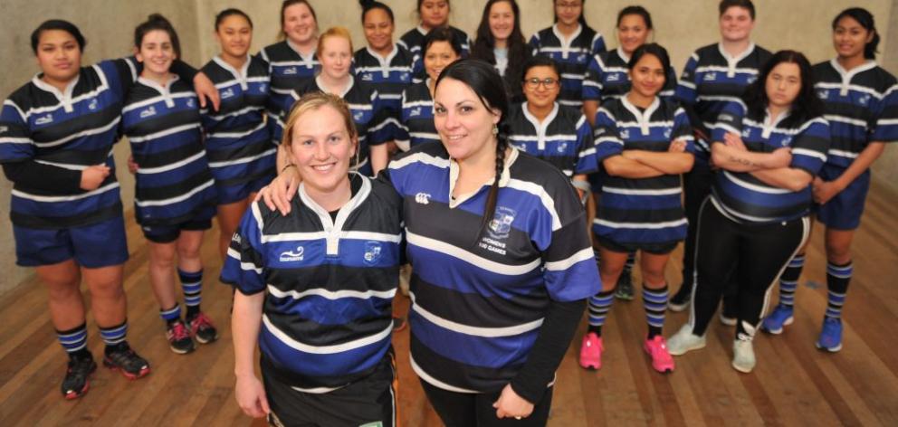 Kirsty Paehua (left), Alarna Lawson and the Kaikorai women's rugby team. PHOTO: GREGOR RICHARDSON