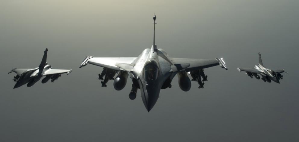 French Army Rafale fighter jets during the operation against Syria. Photo: REUTERS/ECPAD