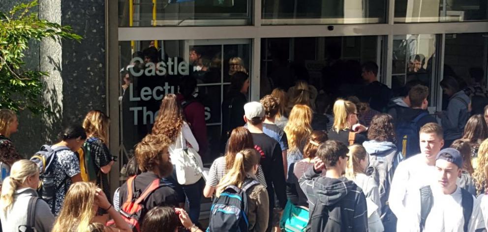 Students locked in an infinite chain of causality crowd into the Castle St lecture theatre. Photo: David Loughrey