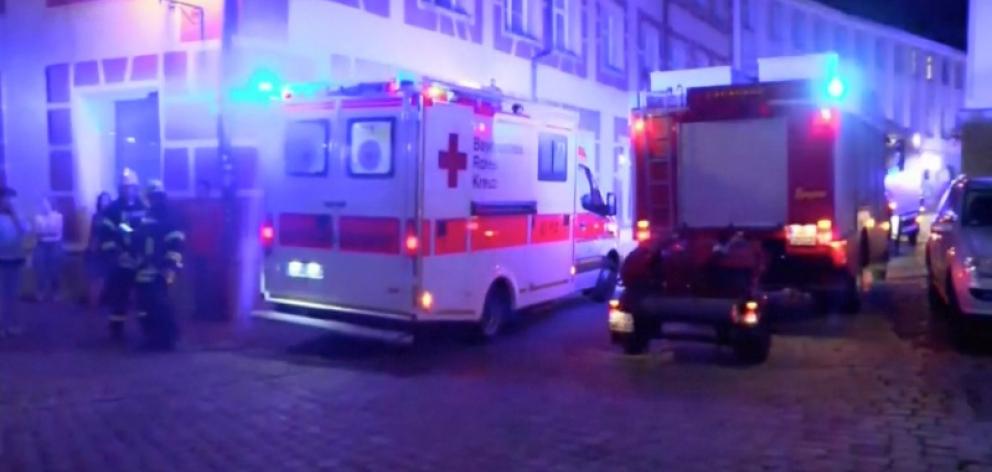 Emergency workers at the scene on Sunday. Photo: Courtesy News5 via Reuters