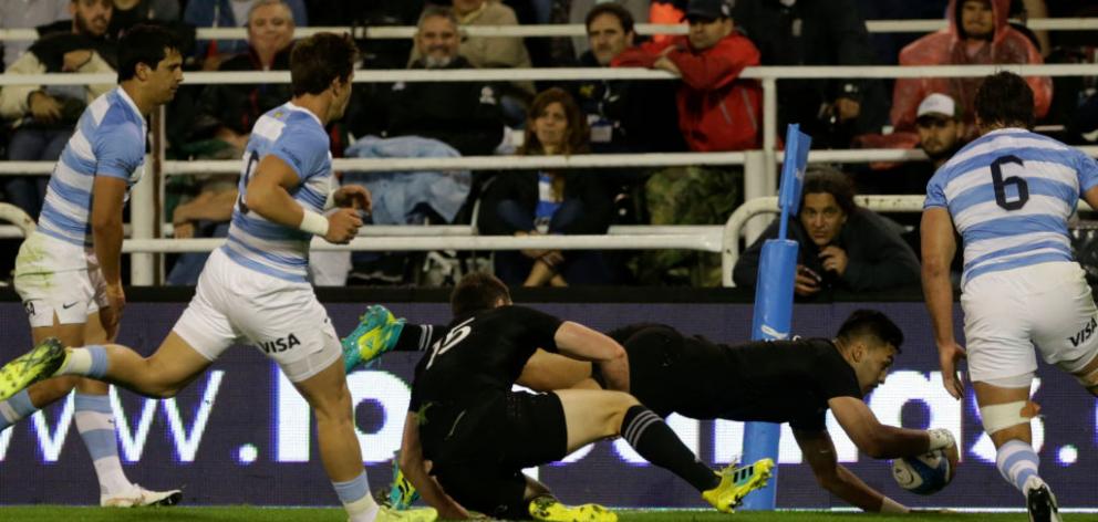 Rieko Ioane of New Zealand scores a try against the Pumas in Buenos Aires. Photo: Getty Images 