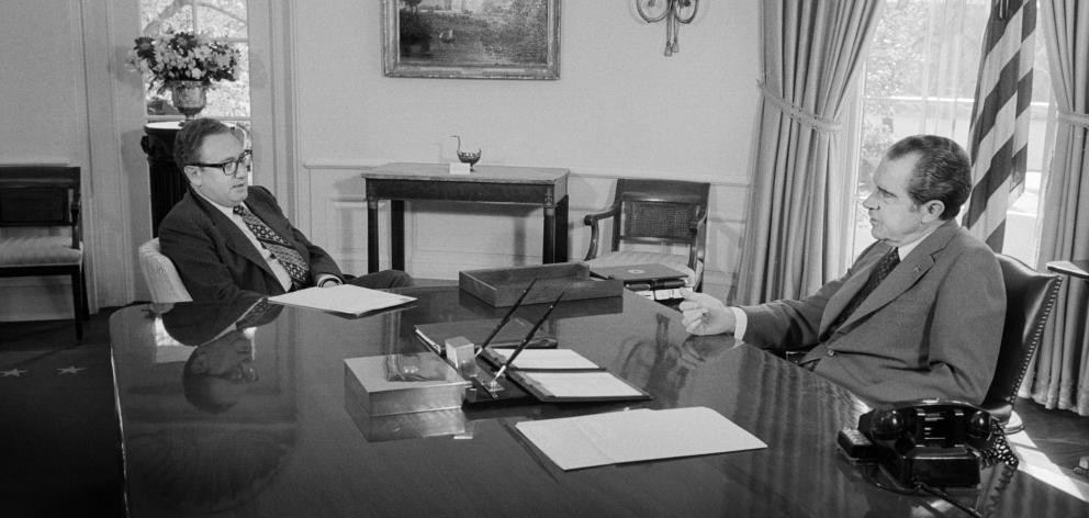 Secretary of State Henry Kissinger with US President Richard Nixon at the White House in 1974....