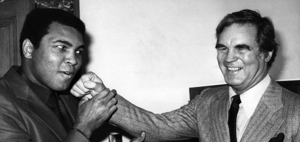 Muhammad Ali (formerly Cassius Clay), left, with Tony Madigan in 1980. Photo: Getty Images
