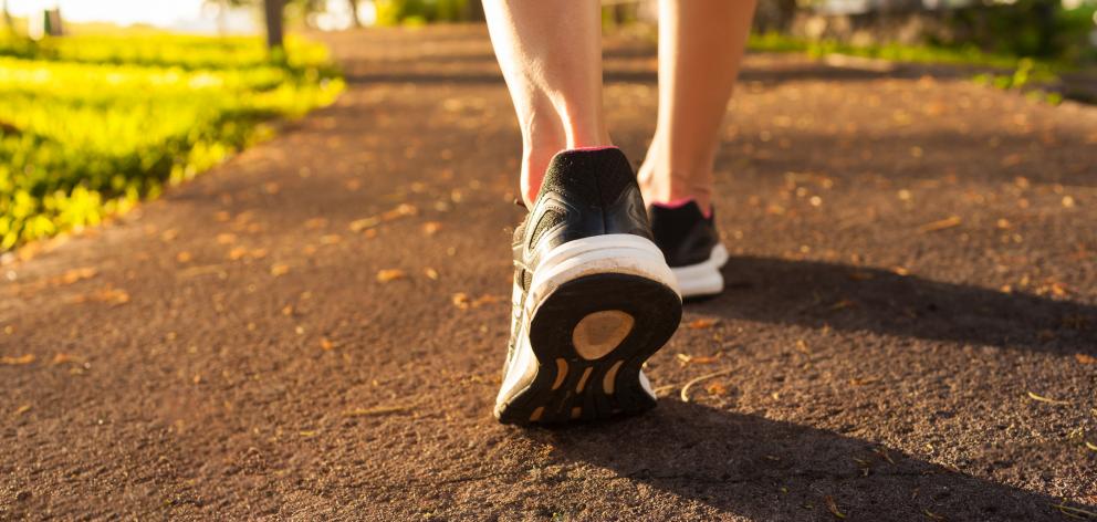 Researchers found a walk after eating resulted in significantly lower blood glucose levels. Photo...