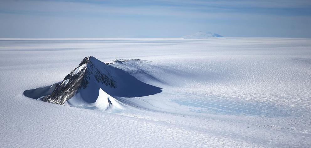 A section of the West Antarctic ice sheet, as seen from a window of a Nasa Operation IceBridge ...