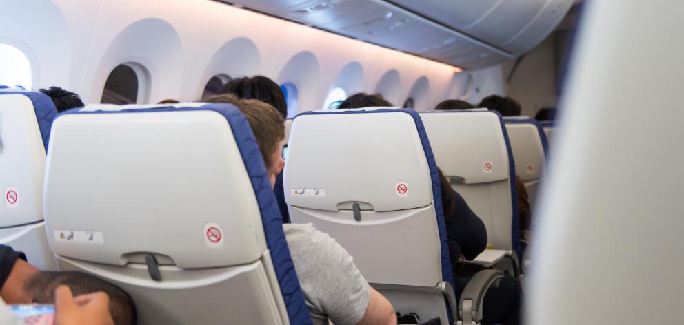 Qantas frequent flyers will wear special technology to measure the impact the cabins lighting and...