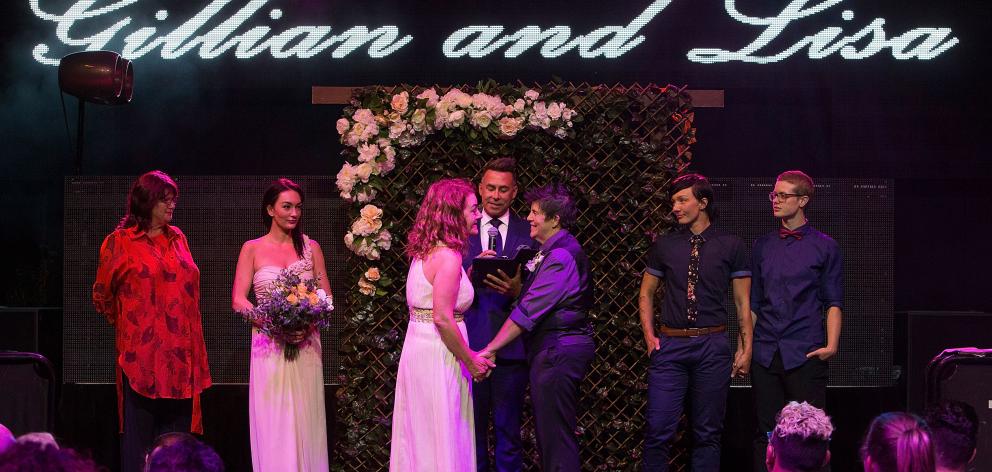 Gillian Brady and Lisa Goldsmith in Perth were one of many couples to get married in midnight ceremonies throughout Australia. Photo: Getty Images 