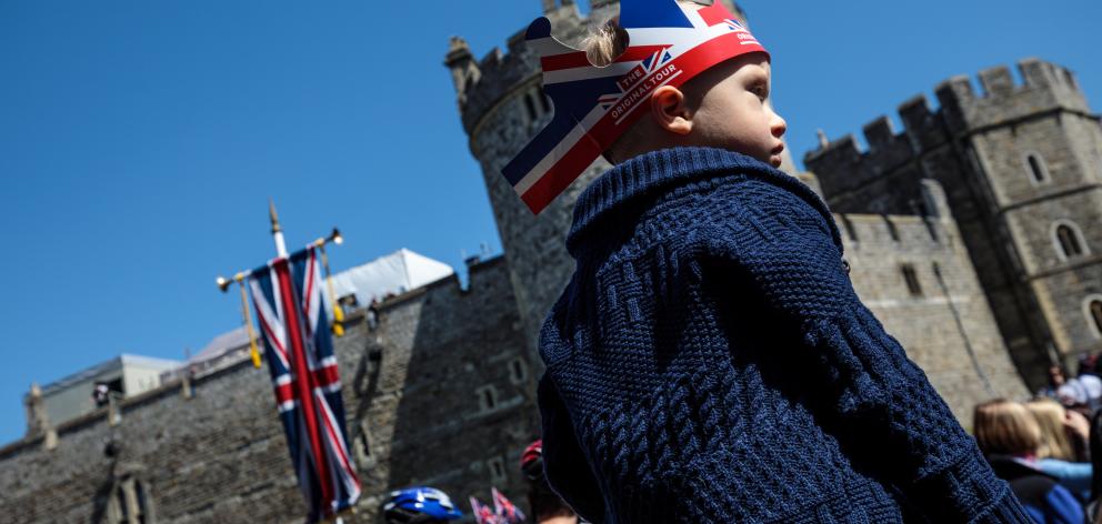 Police are expecting more than 100,000 people to throng the streets outside the castle, the Queen...
