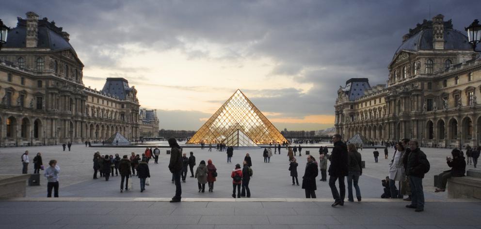 A late-night visit to the Louvre is ideal if you want to avoid big crowds. Photo: Getty Images