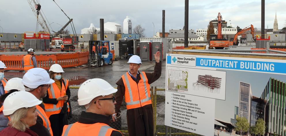 Officials walked around the new Dunedin hospital site to mark the start of building on Friday....