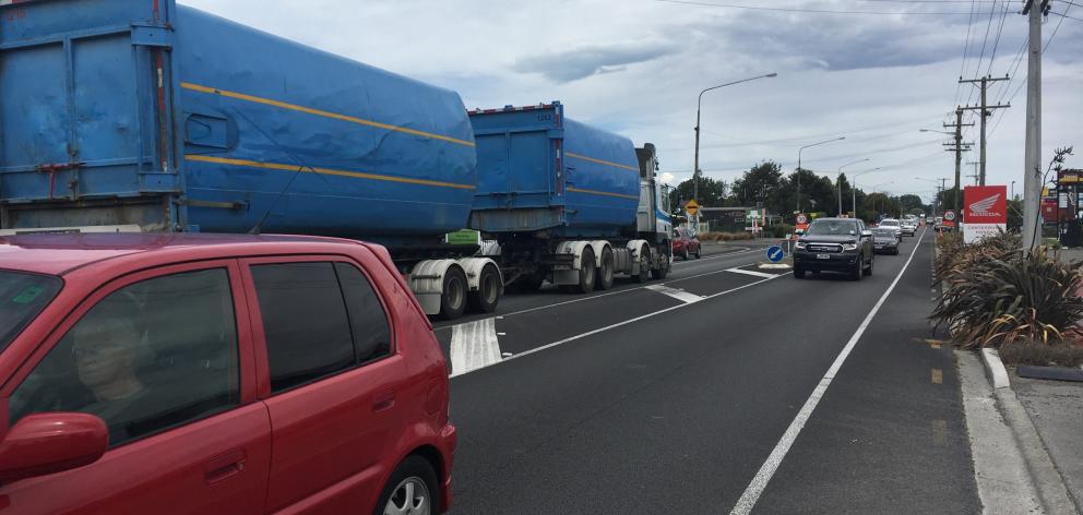 Traffic roars through Woodend's town centre, posing safety concerns for residents. Photo: David...