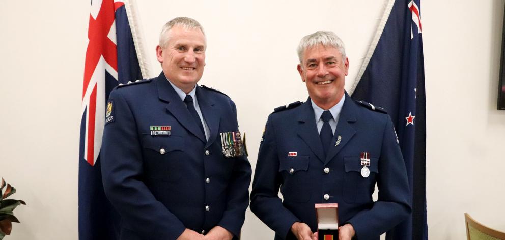 Senior Constable Tony Maw received his Royal Humane Society of New Zealand bronze medal from...