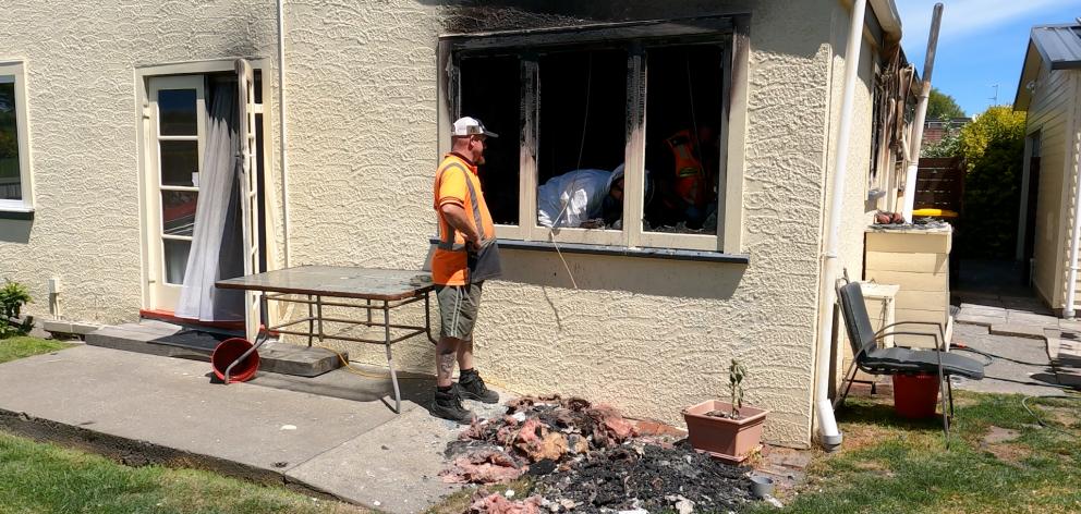 Johnny Brewer inspects the damage. Photo: Geoff Sloan