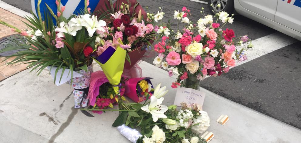 Flowers at the police cordon near the mosque in Deans Ave this morning. Photo: Gregor Richardson