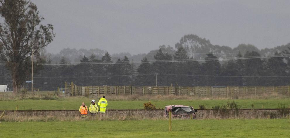 Police at the scene of the double fatal crash. Photo: George Heard