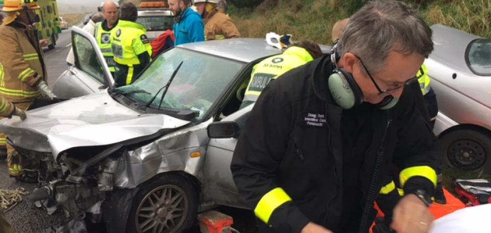 A Fire Service spokesman said firefighters from Palmerston and Waikouaiti attended the crash and were needed to free two people from the mangled vehicles. Photo: Supplied