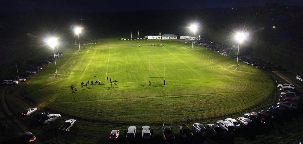 The Maheno Domain lights up for the club rugby game between Maheno and Excelsior on Wednesday...