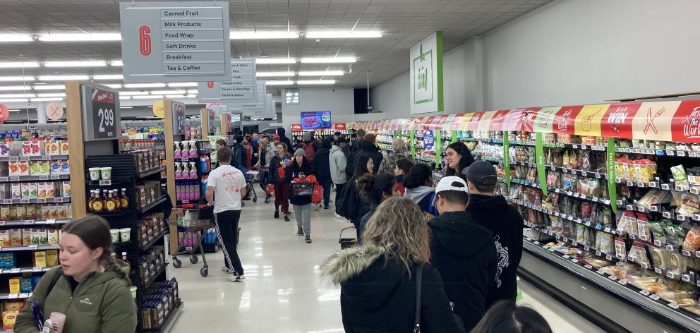 Shoppers line up in a queue at Centre City New World in Dunedin just after the Prime Minister announced the country would enter Alert Level 4 at midnight. Photo: Supplied