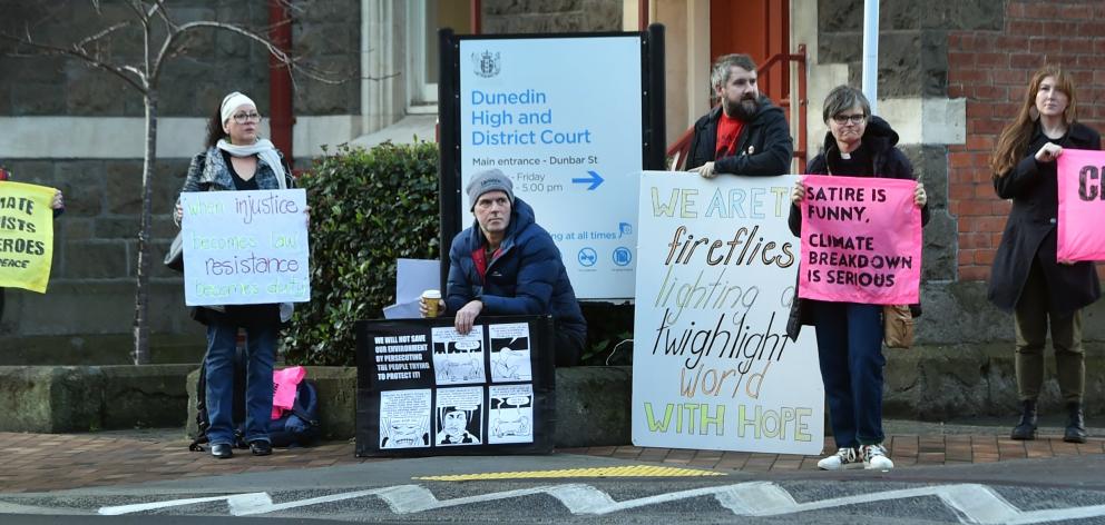Supporters of Rosemary Penwarden make  their message clear outside court yesterday. PHOTO: PETER...