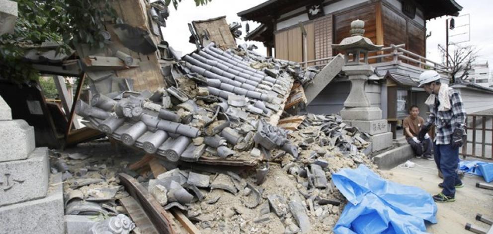 Damaged Myotoku-ji temple caused by an earthquake is seen in Ibaraki, Japan. Photo: Kyodo via Reuters