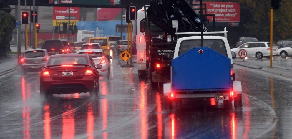 Rain pelts cars on  Cumberland St this morning. Photo: Stephen Jaquiery