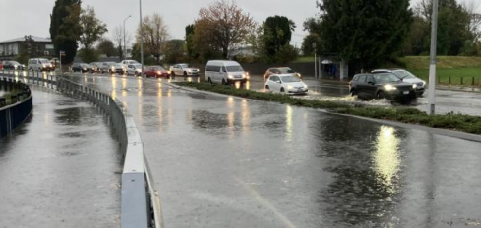 Heavy rain has been falling in Christchurch, flooding some roads. PHOTO GEOFF SLOAN/STAR NEWS
