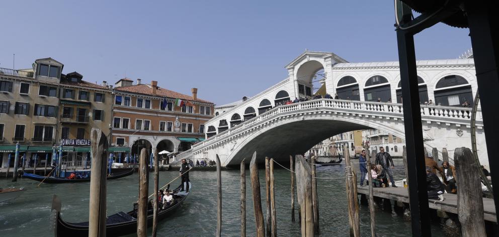 Fashion company Diesel has helped fund improvements for the Rialto bridge in Venice. Photo: AP
