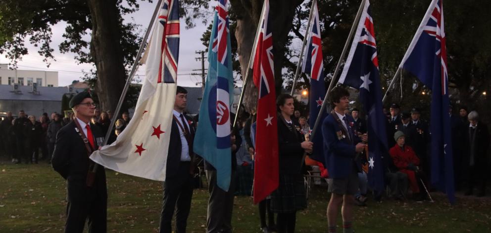 Head pupils from Gore High and St Peters College were flag bearers at the service. PHOTO: SANDY...