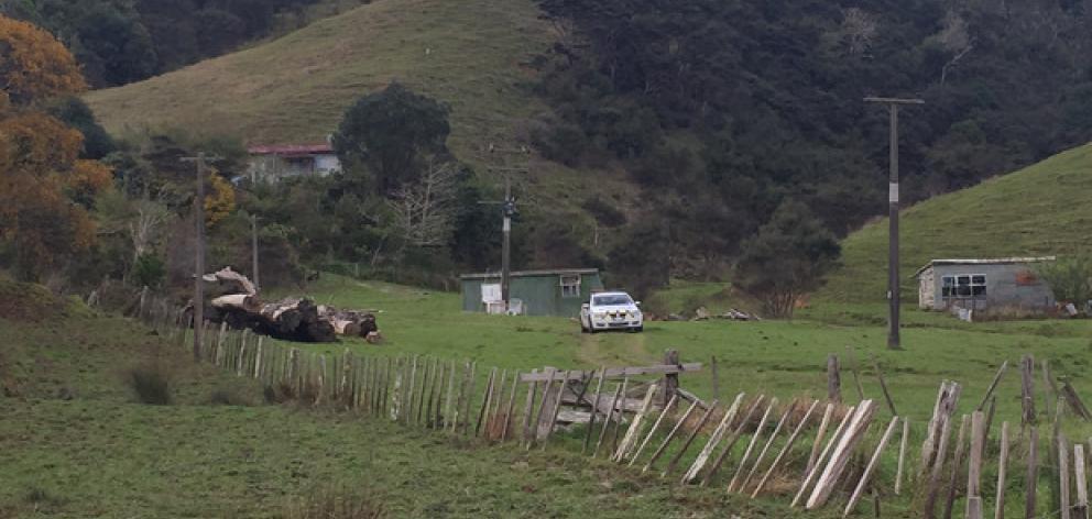 Police at the scene where three bodies were discovered. Photo: NZ Herald

