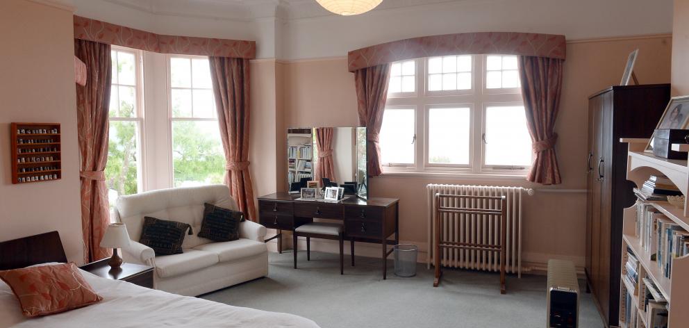 One of the bedrooms, which has a harbour view and its own veranda. 