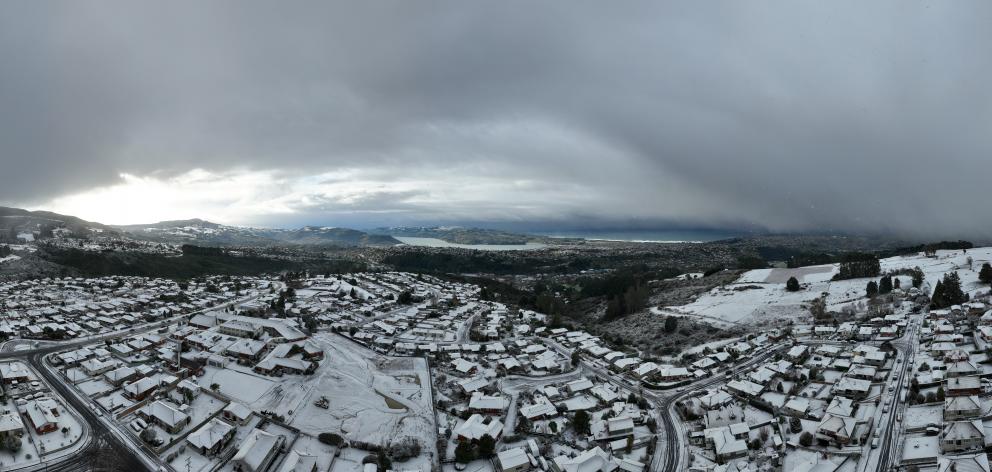 A view of Dunedin's snow-covered hill suburbs from the top of Brockville this morning. Photo:...