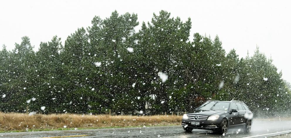 Snow was falling on State Highway 85 between Wedderburn and Lauder in Central Otago on Sunday...