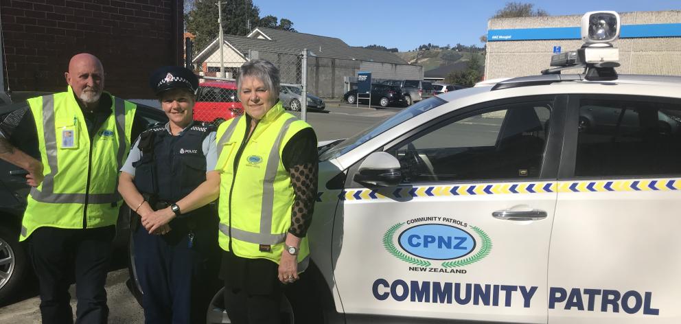 Standing with the new patrol vehicle are (from left) Mosgiel-Taieri Community Patrol chairman...