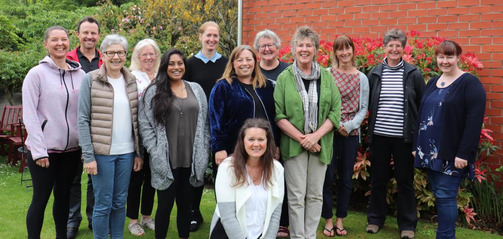 Volunteers with the Otago Community Hospice Biography Service. Pictured are (standing, from left)...