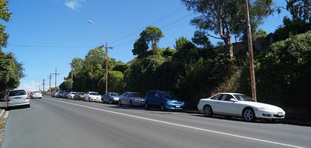 The number of cars for sale parked along Mailer St in Mornington, towards Kenmure Rd, has been...