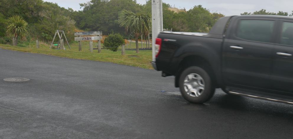 A car passes Ocean Grove sports ground. PHOTO: JESSICA WILSON





