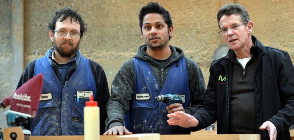 Award-winning apprentice joiner Mohamed Valibhai (centre) at work with Damon Scott (left), of Stevenson and Williams, and 4Trades facilitator Bill Cubitt. Photo by Peter McIntosh Award-winning apprentice joiner Mohamed Valibhai (centre) at work with Damon Scott (left), of Stevenson and Williams, and 4Trades facilitator Bill Cubitt. Photo by Peter McIntosh