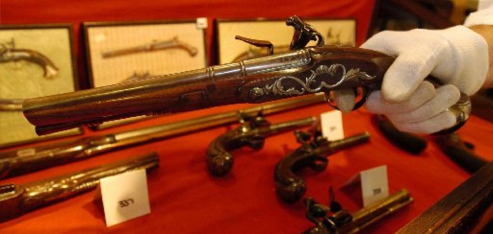 A 17th century Robert Harvey flintlock pistol (one of a pair) sold for $15,000.  Photo by Gregor Robertson