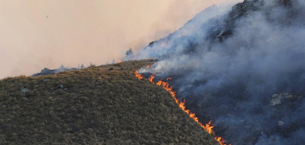 Helicopters fight the July 2012 scrub fire near Hyde. Photo: Craig Baxter.