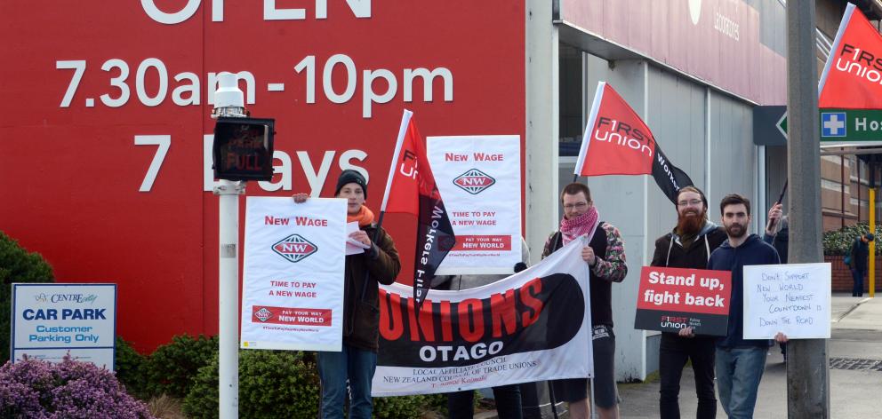 First Union members picket outside the Cumberland St entrance to  Centre City New World, in...