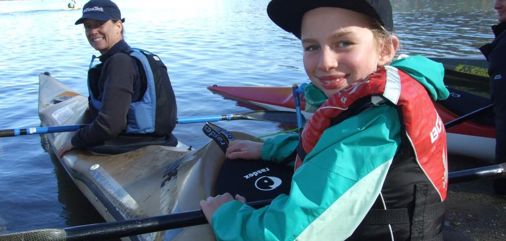 7 Torpedos team member Zoe Bennetts  and her mother Keren prepare to start the kayak leg of the...