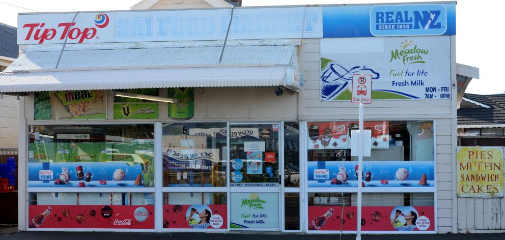 All is quiet at the Sai Food Market in Prince Albert Rd yesterday, the day after the store was...