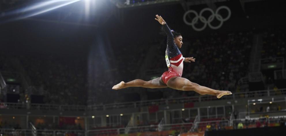 Simone Bilas on the beam during the women's team final. Photo: Reuters