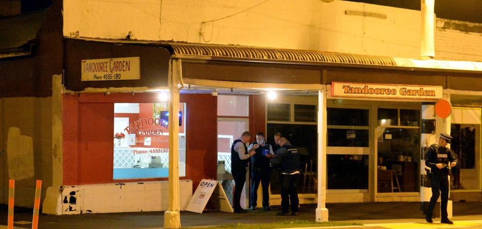 Police at the scene of the Tandooree Garden robbery, in St Kilda. Photo: Linda Robertson