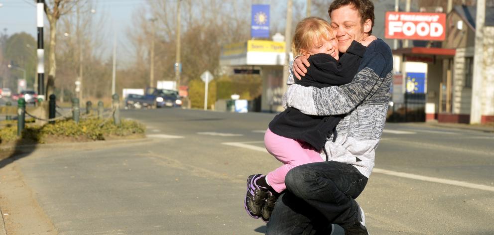 James Winter and his daughter Janae (7), who have been left homeless after a house fire in Milton...