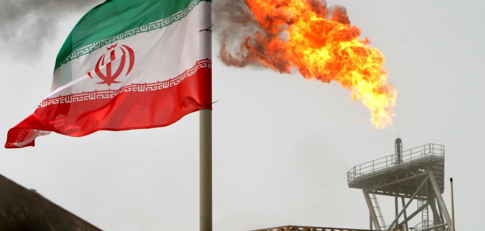 Gas flares on an Iranian oil platform in the Soroush oil fields; Iran has signalled  it is on...